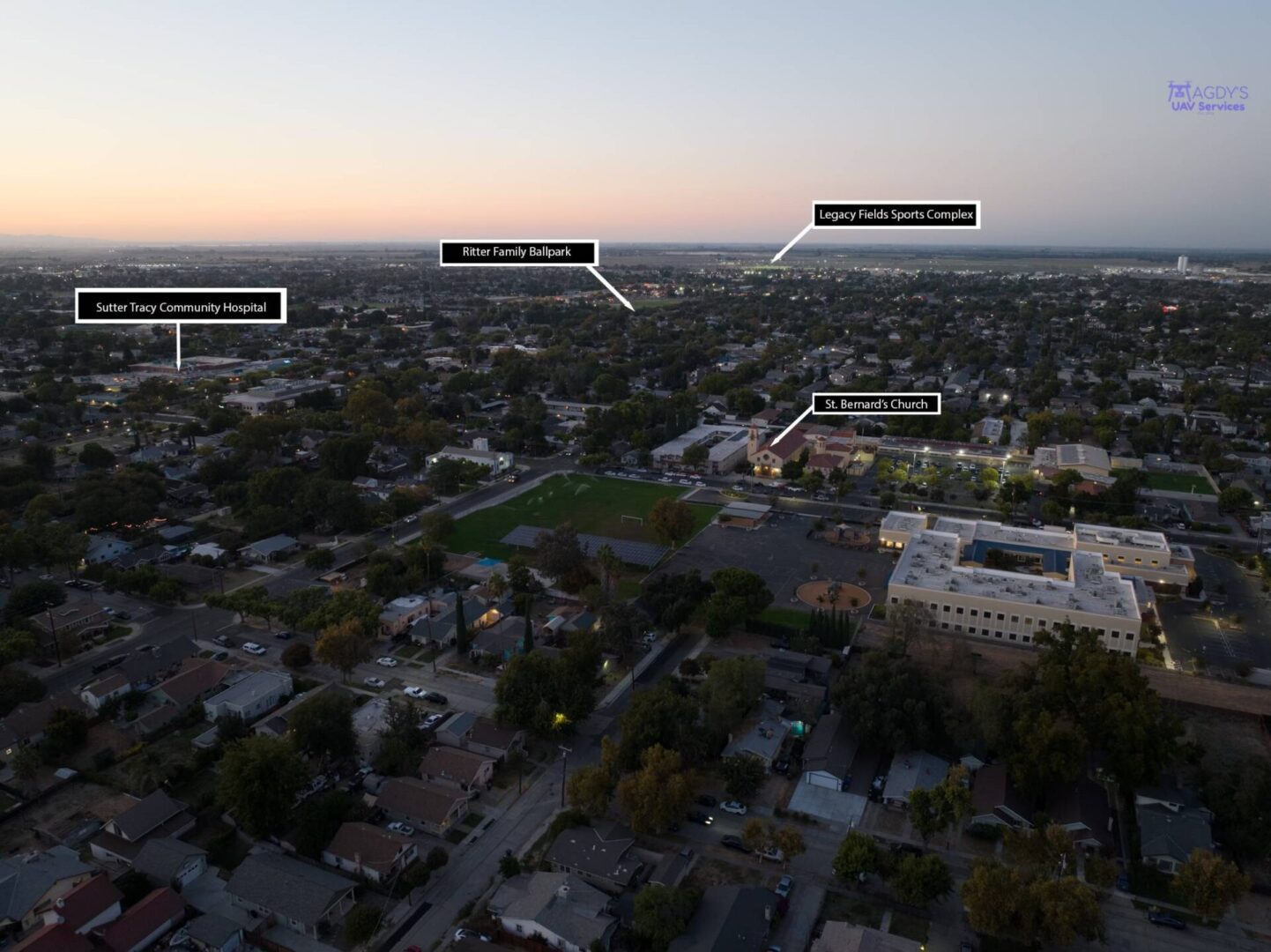 A bird 's eye view of the city at dusk.